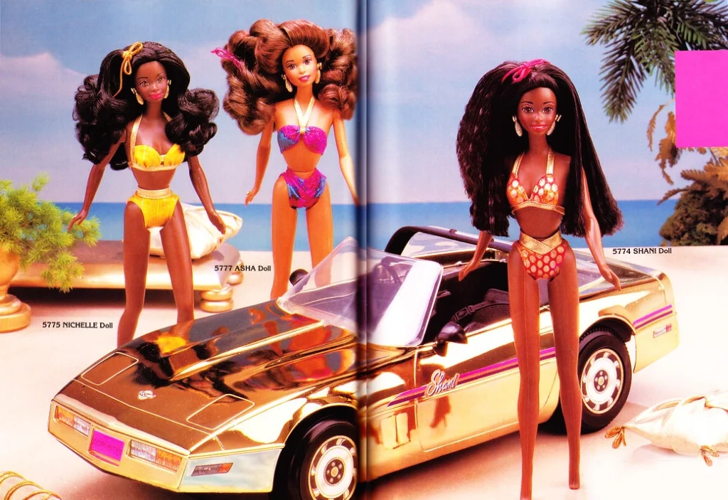 Mattel's line of Shani dolls standing in front of Shani's gold corvette in an inclusive marketing campaign