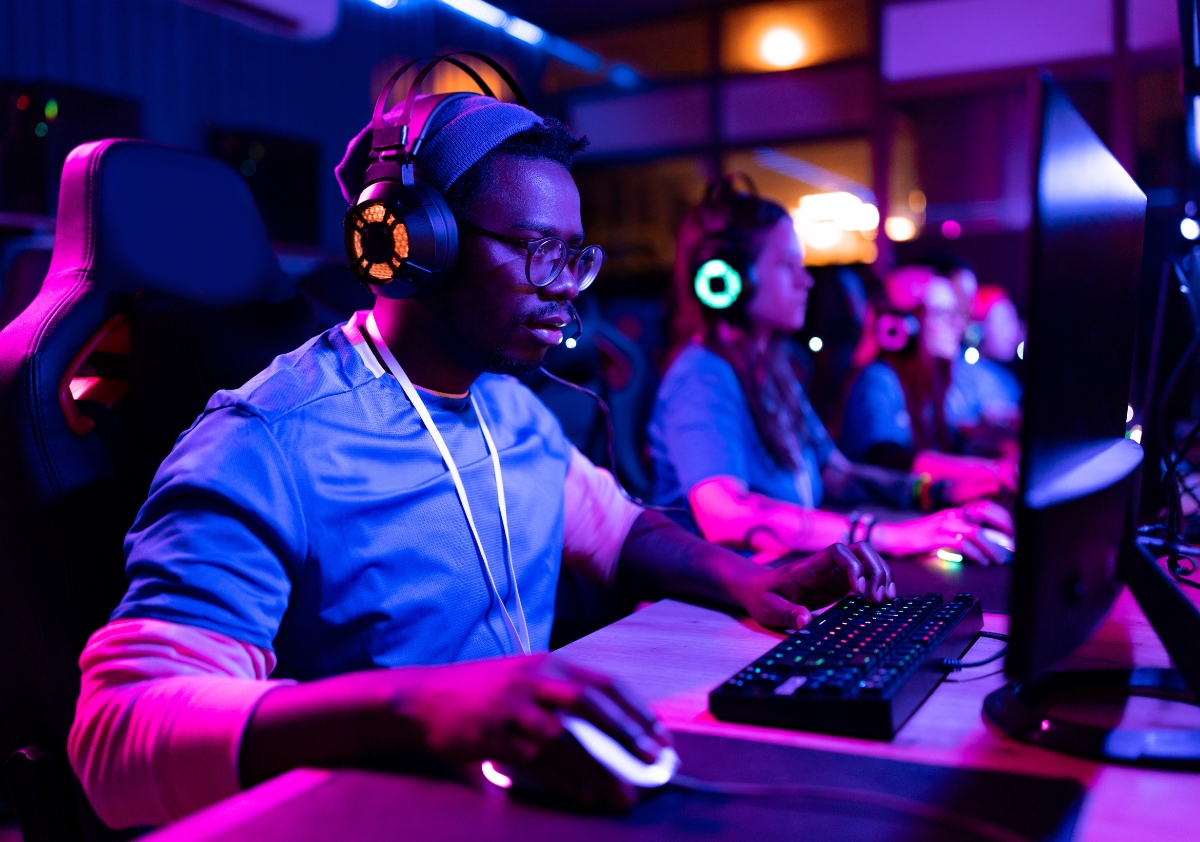 Young Black African American male playing a video game and experiencing in-game advertising